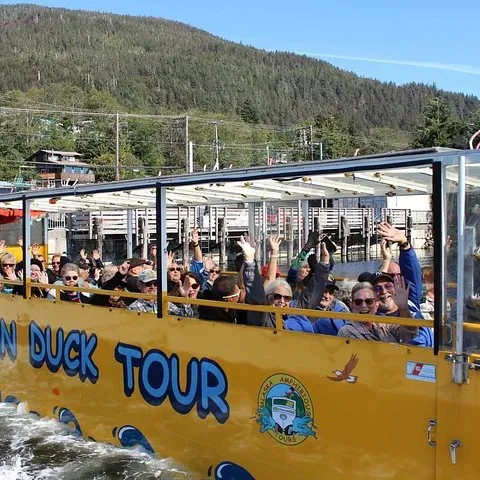 The yellow duck afloat, guests waving